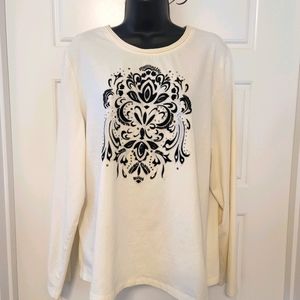 White TanJay long sleeved t-shirt.